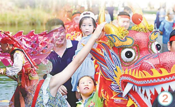 龙潭公园的龙舟竞渡、文艺汇演等活动让市民游客沉浸式体验端午民俗和传统文化。