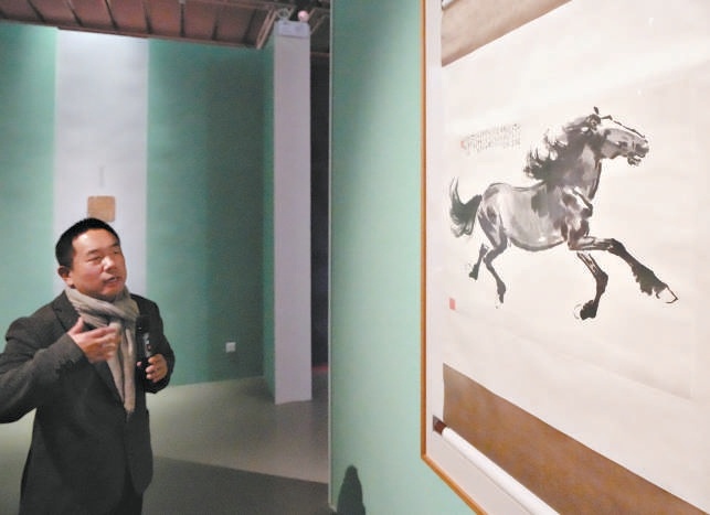 徐骥讲解徐悲鸿赠齐白石的《千里驹》。
