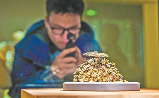 李靜訓墓出土的鬧蛾金釵。