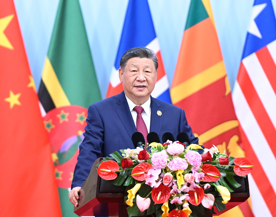 10月13日上午，國家主席習近平在北京國家會議中心出席全球婦女峰會開幕式併發表主旨講話。