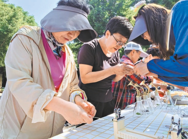 玉淵潭公園舉辦的端午文化體驗活動吸引了眾多市民遊客參與。