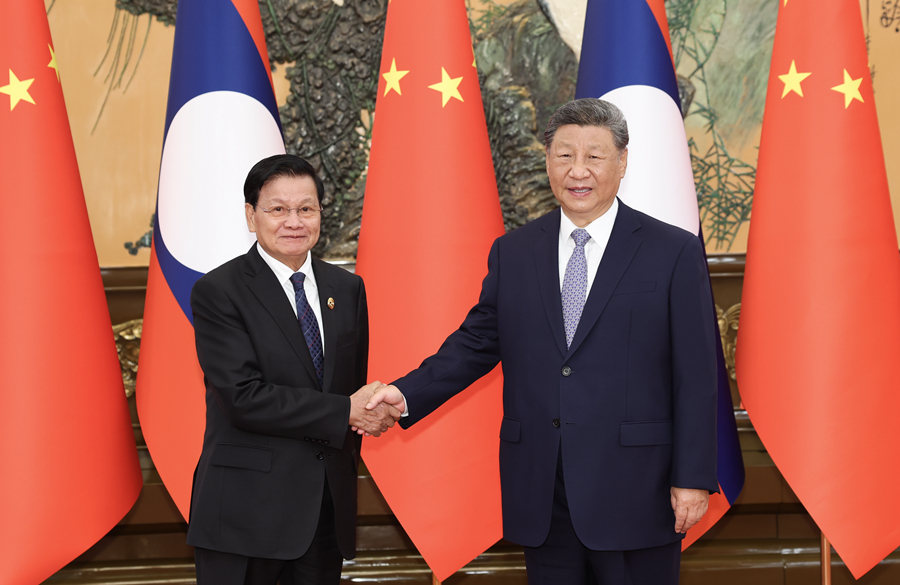 9月4日上午，中共中央总书记、国家主席习近平在北京人民大会堂会见来华出席2025年上海合作组织峰会和纪念中国人民抗日战争暨世界反法西斯战争胜利80周年活动并进行工作访问的老挝人民革命党中央总书记、国家主席通伦。