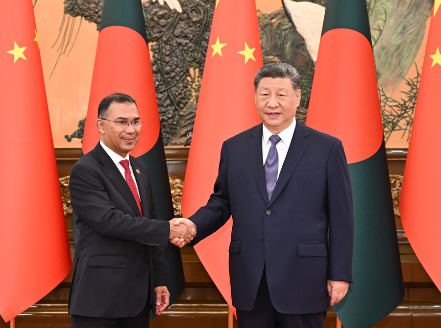 6月26日上午，国家主席习近平在北京人民大会堂会见来华正式访问的孟加拉国总理塔里克。