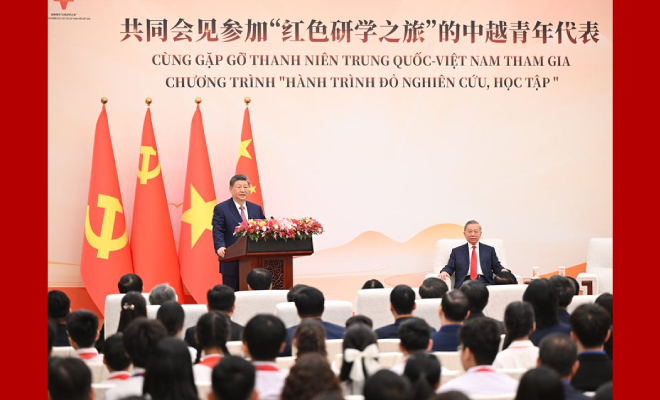 习近平同苏林共同会见中越青年代表