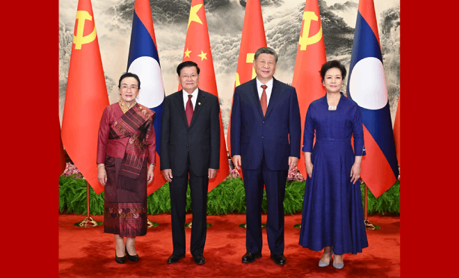 习近平同老挝人民革命党中央总书记、国家主席通伦会谈