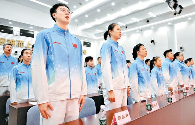 第20届亚运会中国体育代表团成立大会在北京举行。 第20届亚运会中国体育代表团成立大会在北京举行。