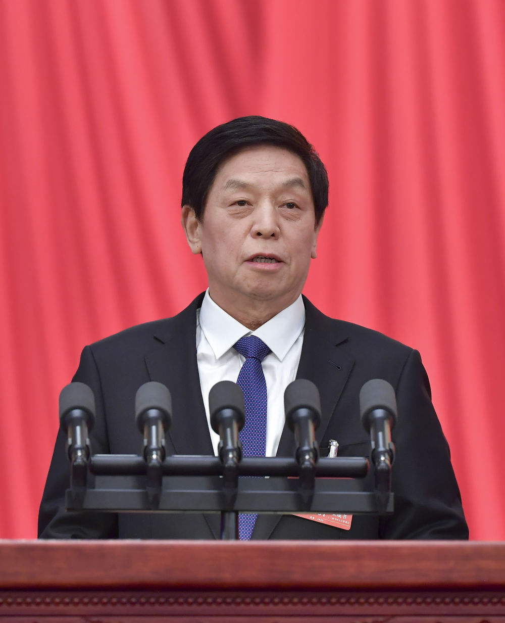 3月7日，十四届全国人大一次会议在北京人民大会堂举行第二次全体会议。受十三届全国人大常委会委托，栗战书委员长向大会报告全国人大常委会工作。