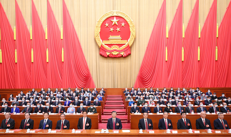 3月13日，第十四届全国人民代表大会第一次会议在北京人民大会堂闭幕。习近平等党和国家领导人在主席台就座。